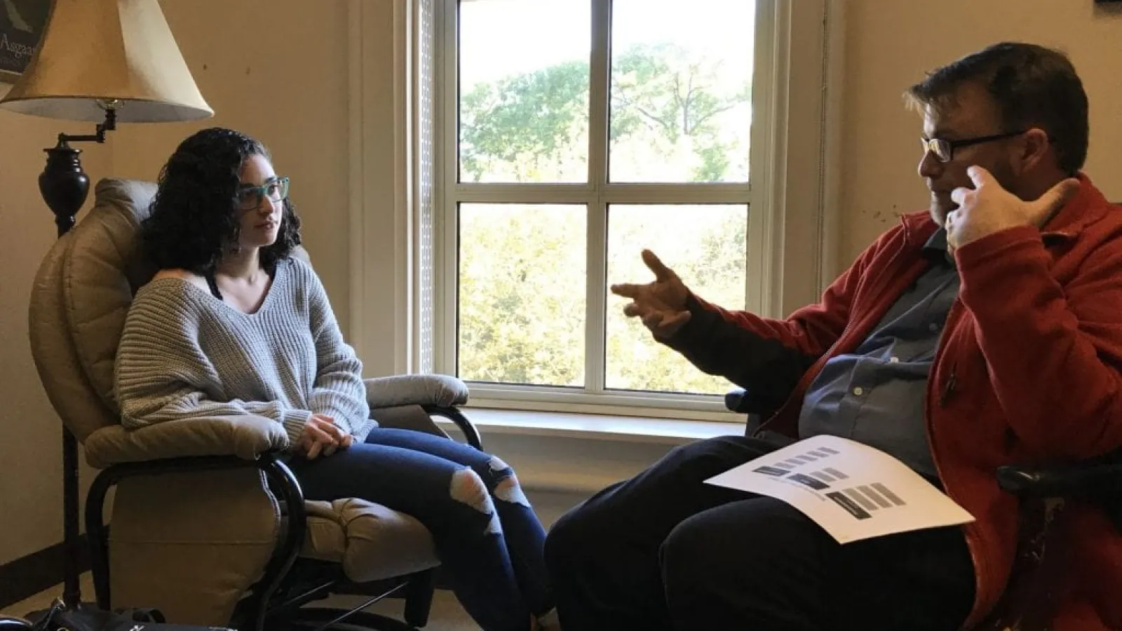 Piers Turner discusses PPE with student